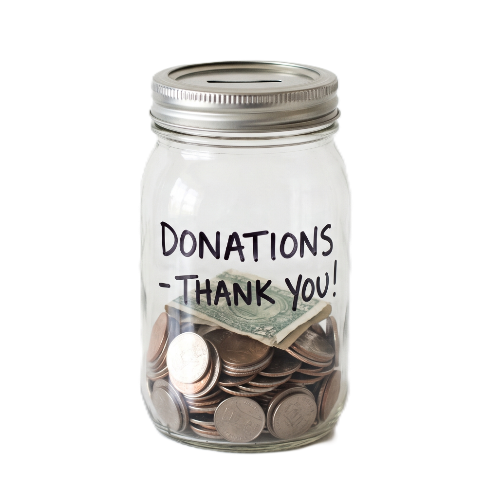 A clear glass mason jar with a silver metal lid, filled with coins and a dollar bill, with the words 'DONATIONS - THANK YOU!' written on the front, isolated on a white background.